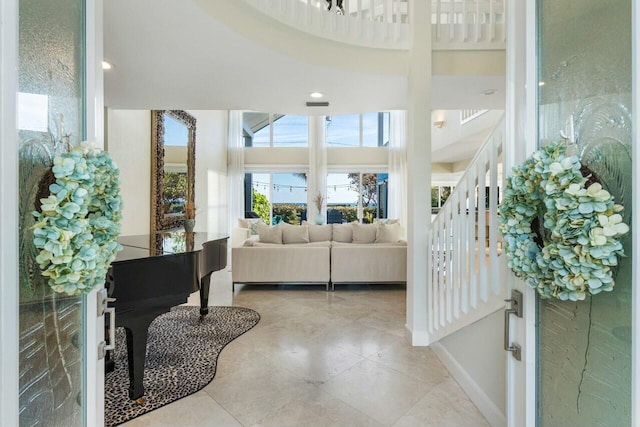 foyer with light tile patterned flooring