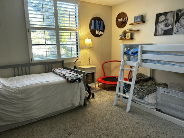 bedroom featuring carpet flooring