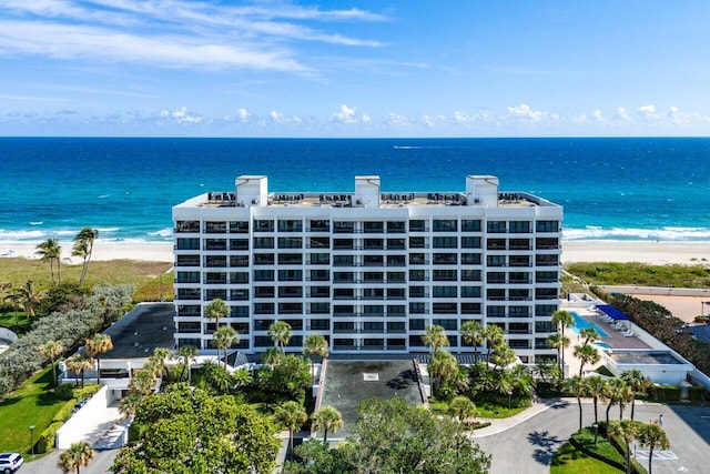 aerial view featuring a water view and a view of the beach