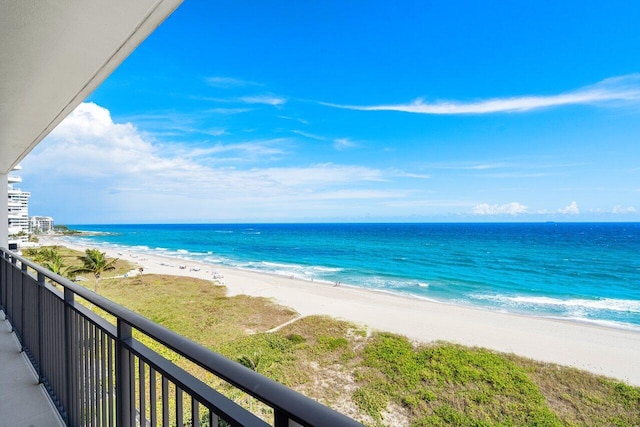 property view of water featuring a beach view