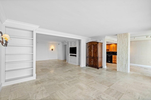 unfurnished living room featuring built in shelves and crown molding