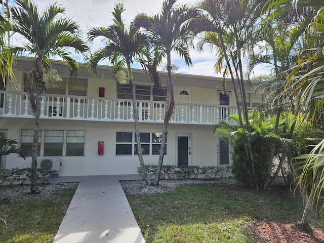 view of building exterior with ac unit