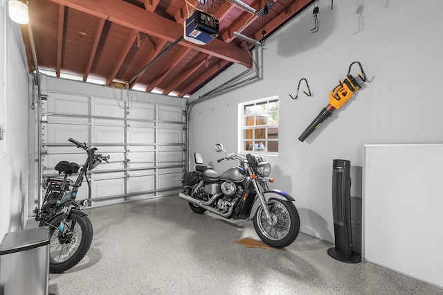 garage featuring a garage door opener