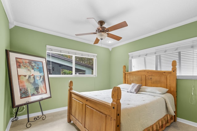 bedroom with ceiling fan and ornamental molding