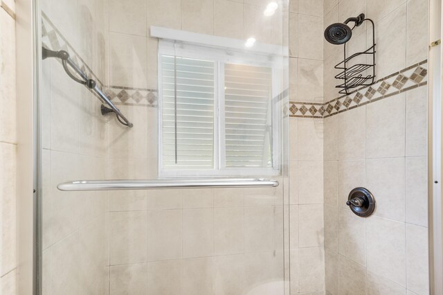 bathroom with an enclosed shower