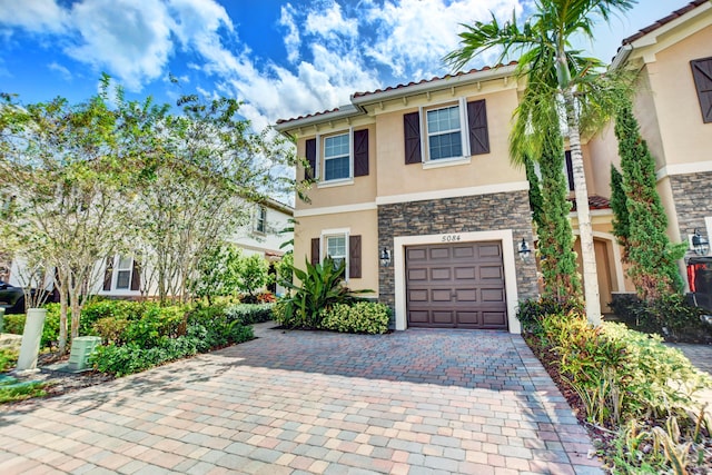 view of front of property with a garage