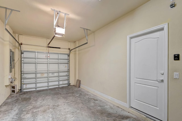 garage featuring a garage door opener and electric panel