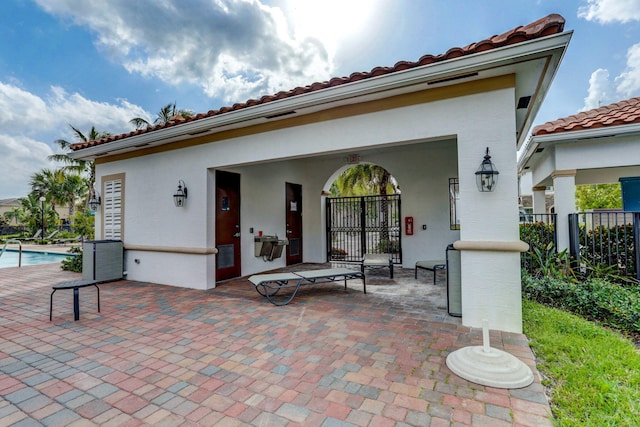 exterior space featuring a fenced in pool