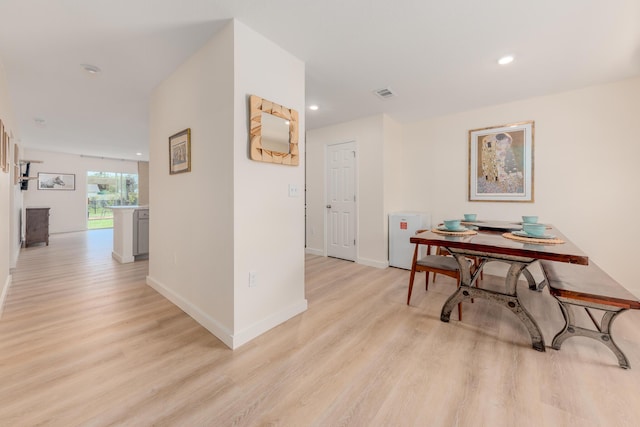 hallway featuring light wood-type flooring