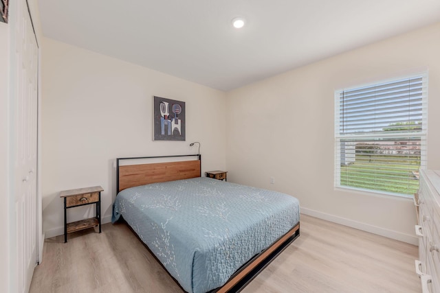 bedroom featuring light hardwood / wood-style flooring