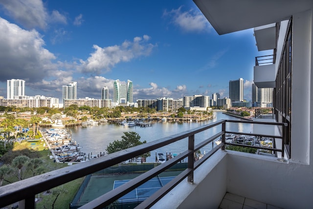 balcony featuring a water view