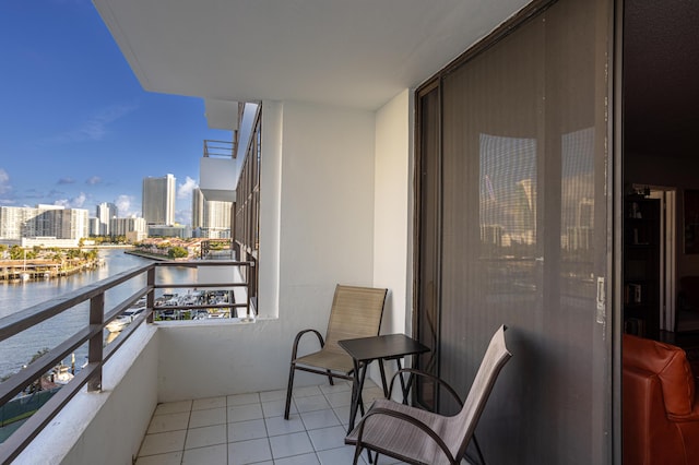 balcony featuring a water view