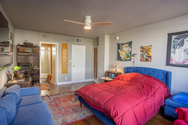 bedroom with dark wood-type flooring and ceiling fan