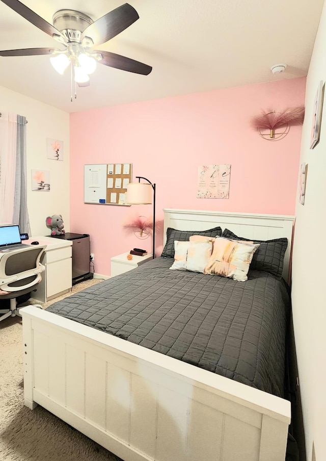 bedroom with ceiling fan and carpet flooring