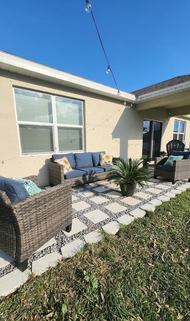 exterior space featuring an outdoor hangout area