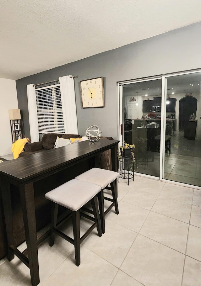 view of tiled dining space