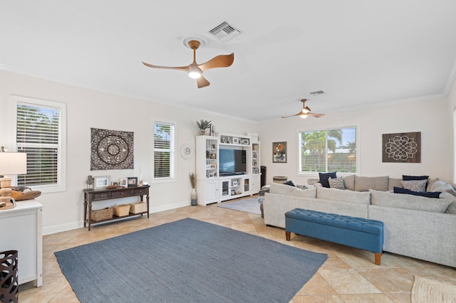 812 NW 26th St, Wilton Manors, FL 33311 - living room with ceiling fan, ornamental molding, light tile patterned flooring, and plenty of natural light