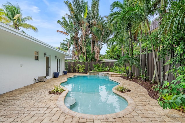 812 NW 26th St, Wilton Manors, FL 33311 - view of swimming pool with a fenced backyard and a patio area