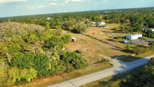 aerial view featuring a forest view