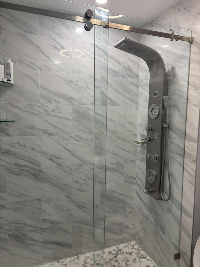 bathroom with a stall shower