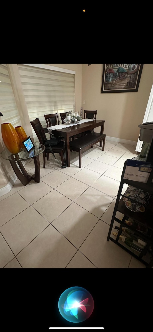 interior space featuring light tile patterned flooring