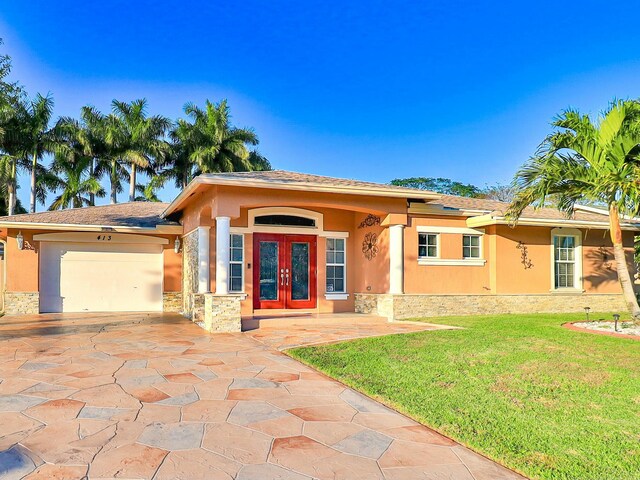 view of pool with a lanai, a patio area, and an in ground hot tub