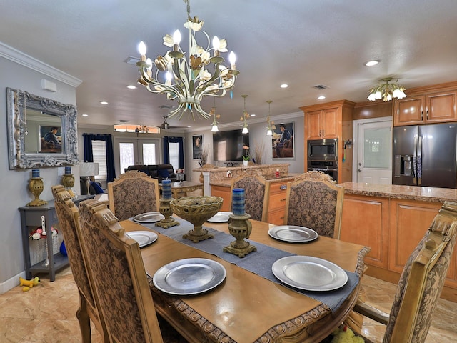 dining area featuring a notable chandelier, crown molding, and french doors