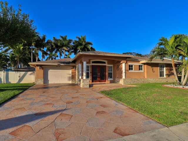 view of front of house featuring french doors and a garage