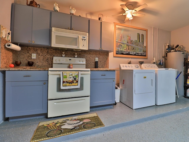 kitchen with water heater, backsplash, washing machine and clothes dryer, and white appliances