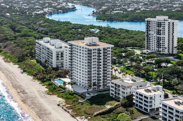 aerial view featuring a water view and a view of the beach