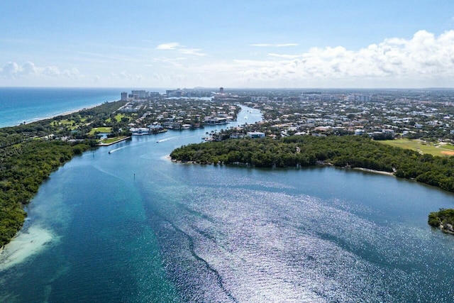 birds eye view of property featuring a water view