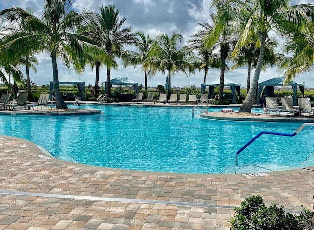 view of swimming pool featuring a gazebo