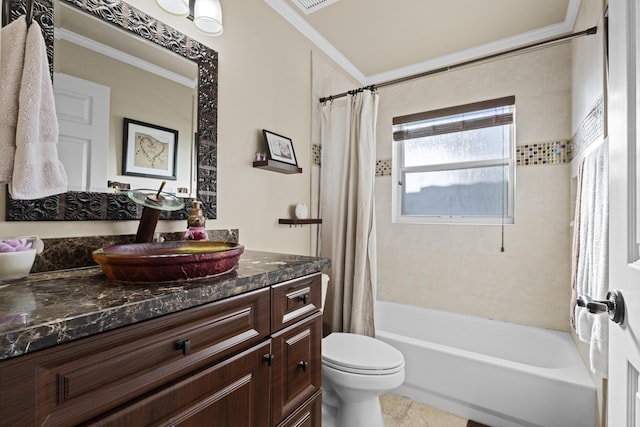 full bathroom featuring ornamental molding, toilet, vanity, and shower / bath combo