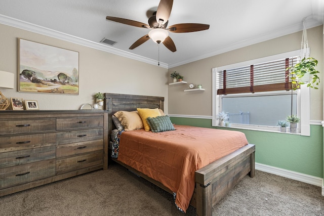 bedroom featuring crown molding, ceiling fan, and carpet floors