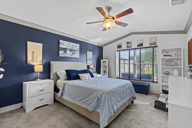 bedroom with light colored carpet, vaulted ceiling, ornamental molding, and ceiling fan