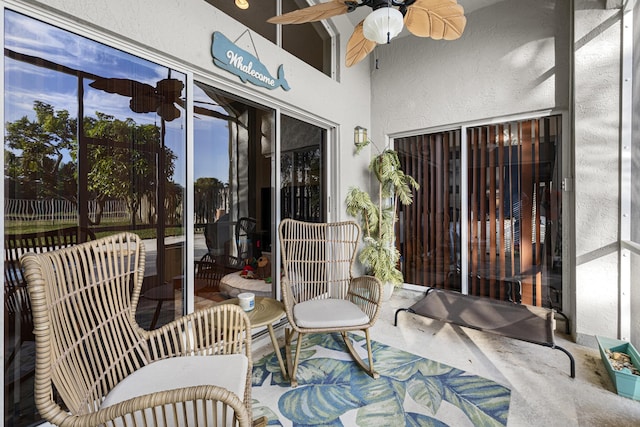 view of patio featuring ceiling fan