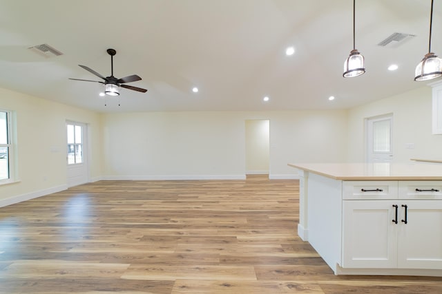 interior space featuring ceiling fan and light hardwood / wood-style flooring