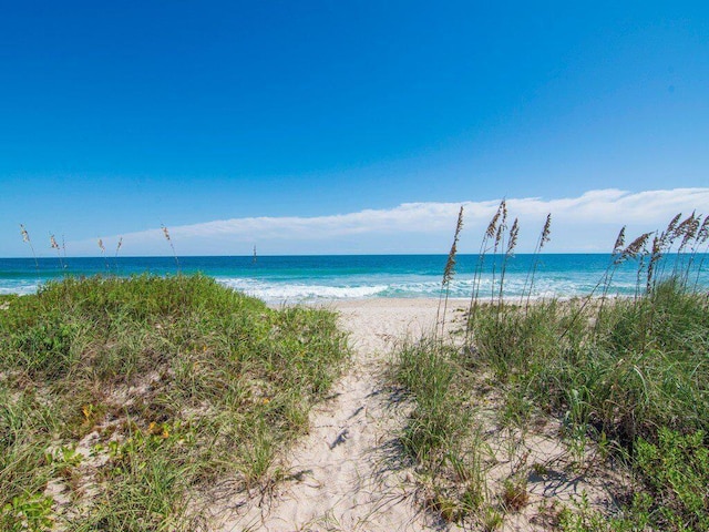 property view of water featuring a view of the beach