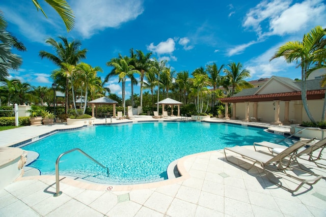 pool featuring a patio area and a gazebo