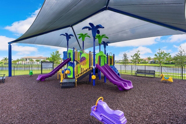 view of play area with a water view