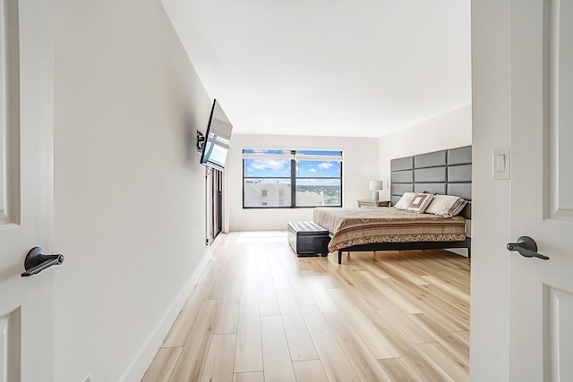 bedroom featuring light hardwood / wood-style floors