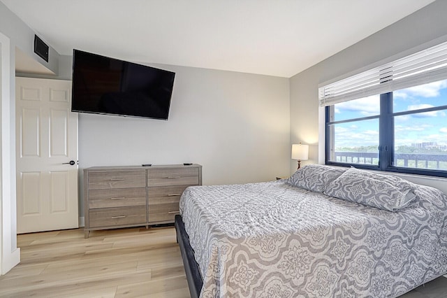 bedroom featuring light hardwood / wood-style floors