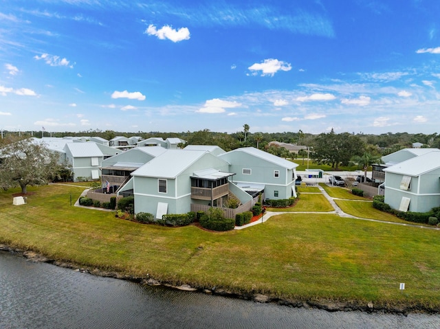 drone / aerial view with a water view