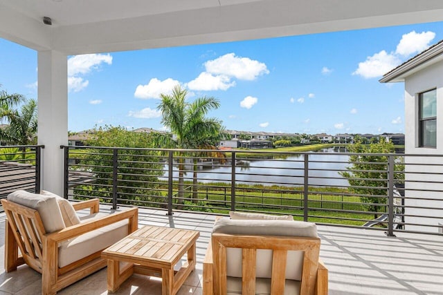 balcony featuring a water view