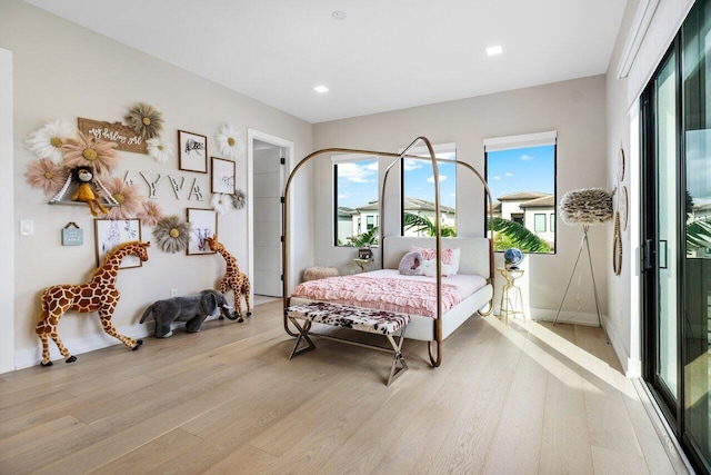 bedroom with light hardwood / wood-style flooring