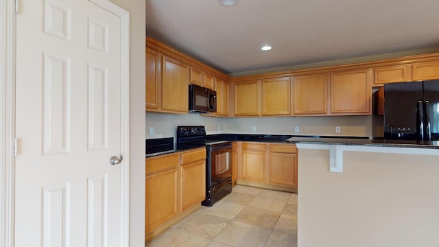 6906 NW Kowal Ct, Port Saint Lucie, FL 34986 - kitchen featuring black appliances and recessed lighting