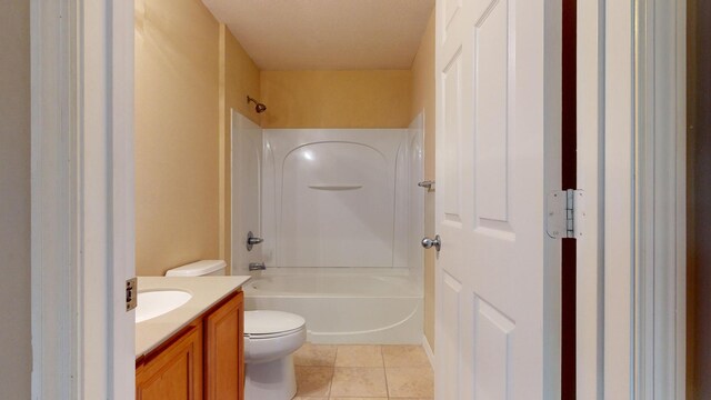 full bathroom featuring vanity, bathtub / shower combination, and toilet