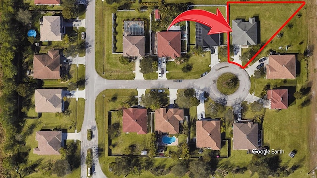 6906 NW Kowal Ct, Port Saint Lucie, FL 34986 - aerial view of property's location with nearby suburban area