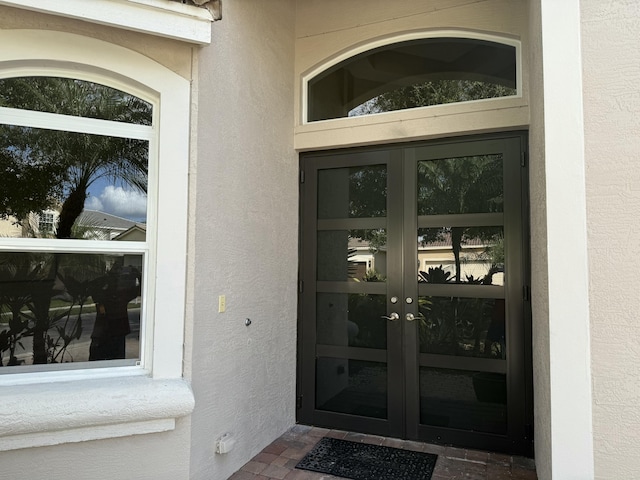 doorway to property featuring french doors