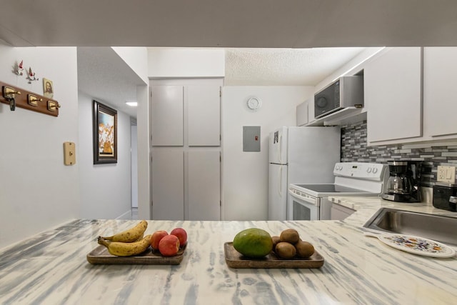 kitchen with sink, a textured ceiling, white electric stove, electric panel, and backsplash